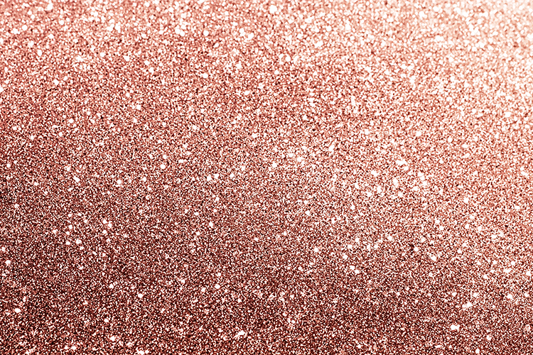 Rose gold glitter background with a shiny & sparkly texture