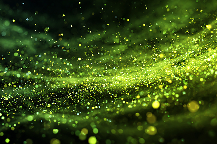 Green background with sparkling particles and glowing lights