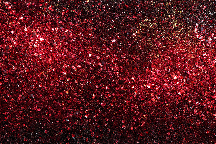 Red glitter background with sparkling sequins & dark tone