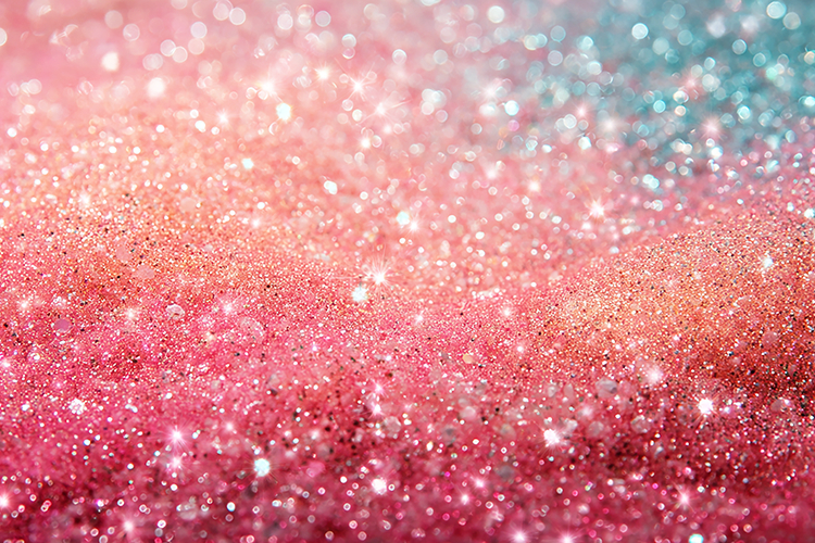 Pink and blue glittery background with sparkling particles