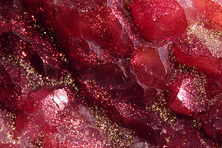 Red crystal formation with gold specks