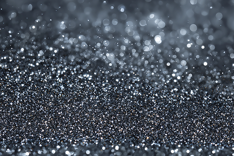 Sparkling silver glitter and white specks of light