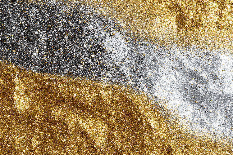 Glitter background with gold, silver, and black sparkles
