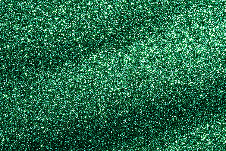 Green glitter background with sparkling texture and shining