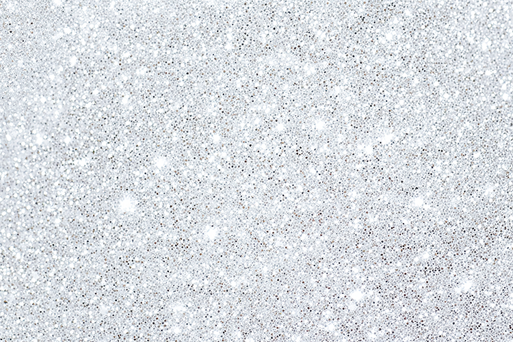 Sparkly surface with small black and white dots
