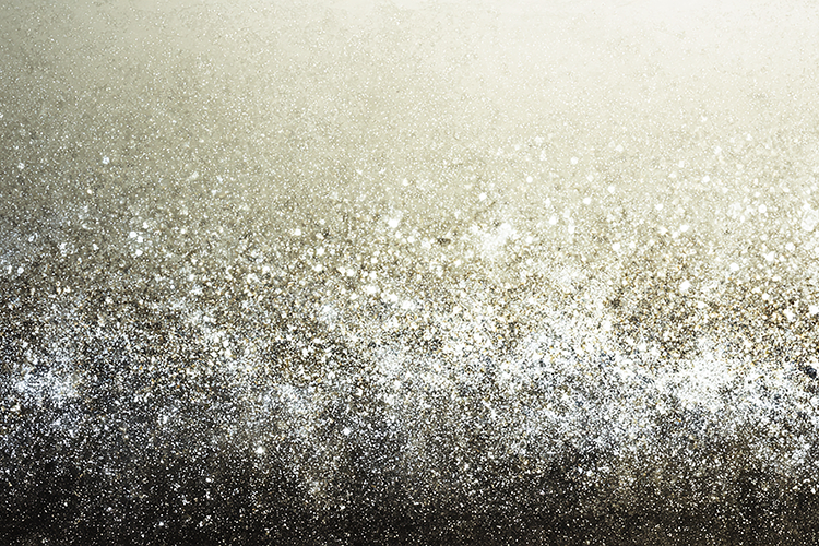 A sparkling background with white particles on a gradiant