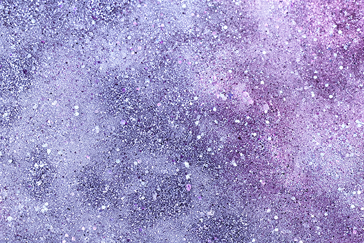 purple glitter background with small sparkly particles