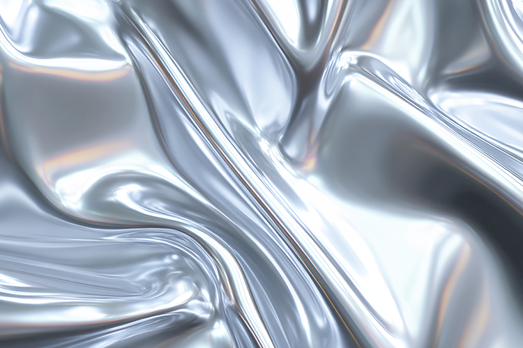 Shiny, metallic surface with smooth, flowing curves