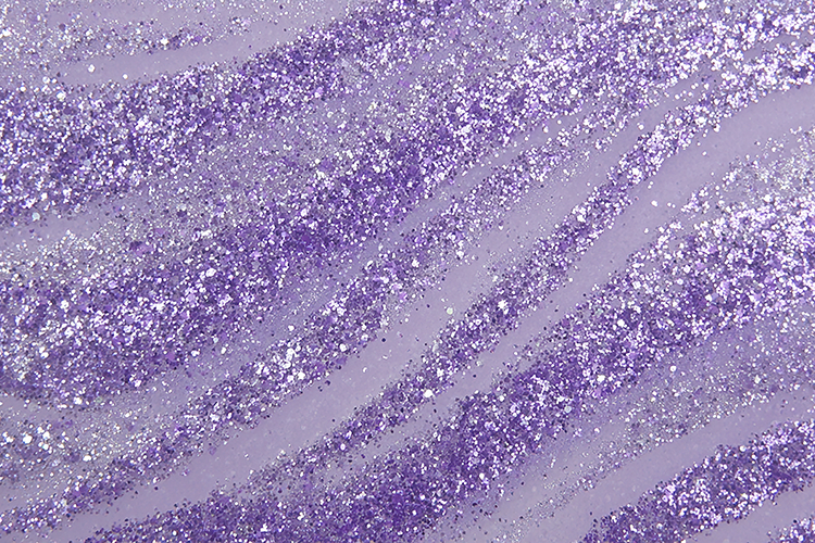 Purple glitter background with sparkling diagonal stripes