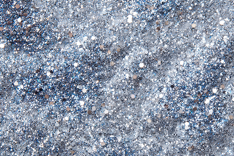 Textured surface with a mix of white, gray, and blue specks