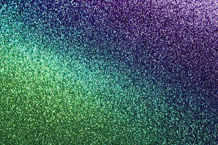 Glittery background with rainbow hues