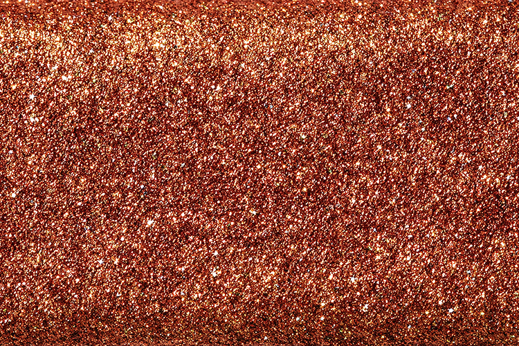 Red glitter texture with golden sparkles