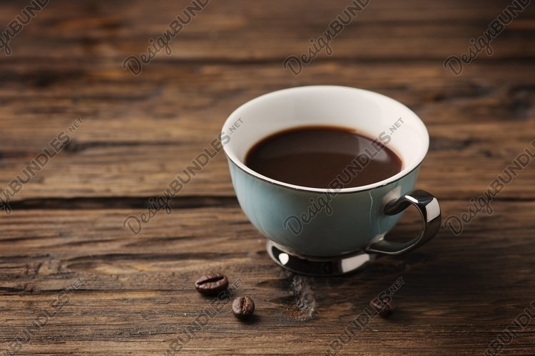 Cup of italian strong coffee espresso on the vintage table example image 1