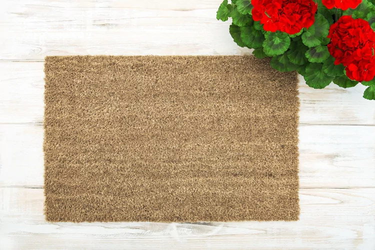 Coir doormat mock up geranium plant. Floral template mockup