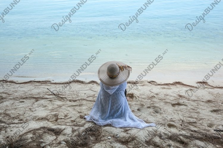 Woman looking at sea view on the beach