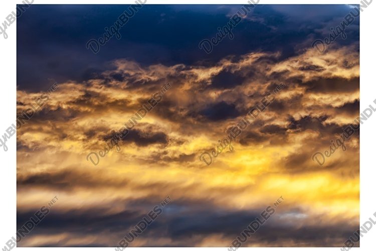 dark clouds and bright sunlit sky