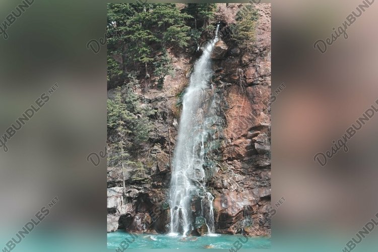 Vertical shot of the mountains covered example image 1