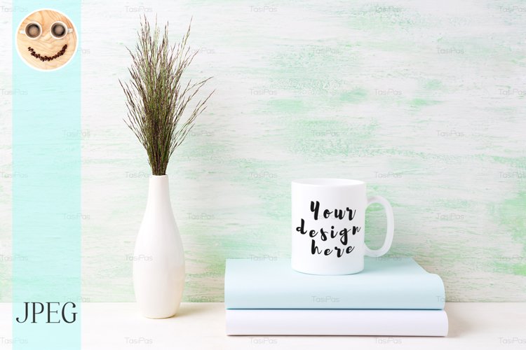 White coffee mug mockup with dark meadow grass in vase example image 1