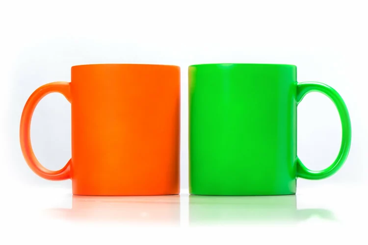 Mug mockup green orange stock photo