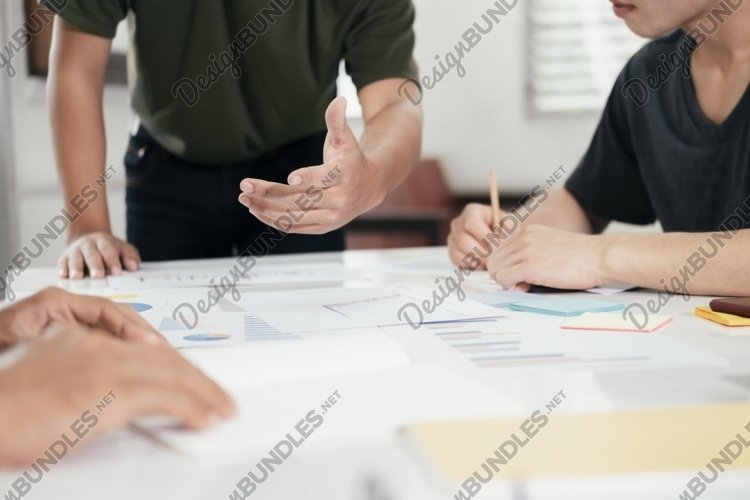 Young startup businessmen teamwork brainstorming. example image 1