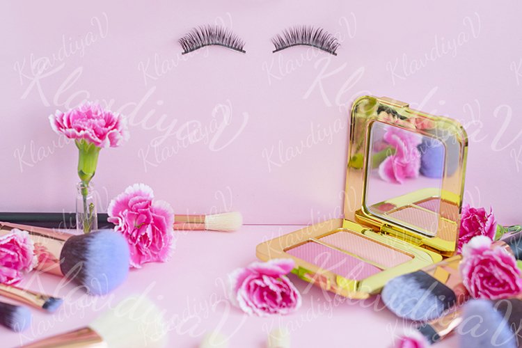 premium makeup brushes and blush on a colored background example image 1