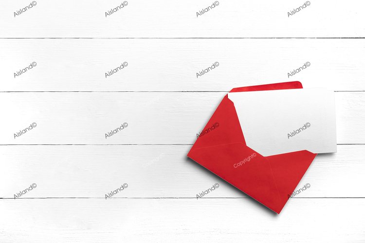 Envelope on white wooden surface. Valentines day letter.