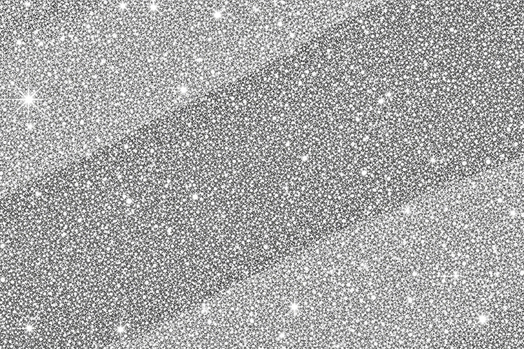 A sparkling silver glitter background with small white stars