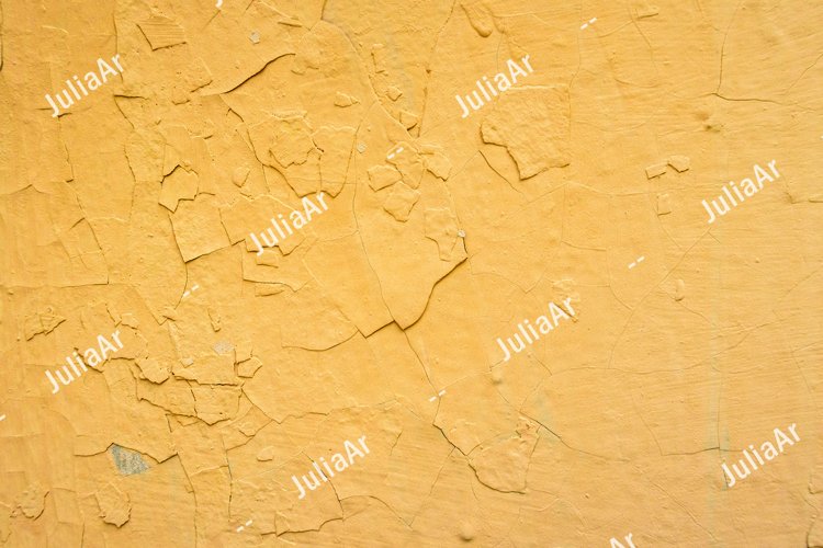 Yellow wall with peeling paint. A lot of paint layers. example image 1