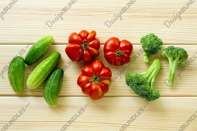 Set of vegetables. Tomatoes, cucumbers and broccoli example image 1