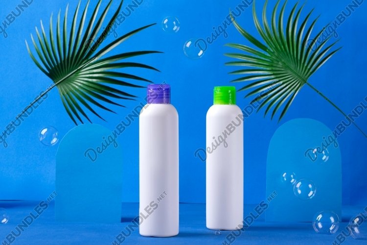 Mockup of beauty product in white bottles with bubbles