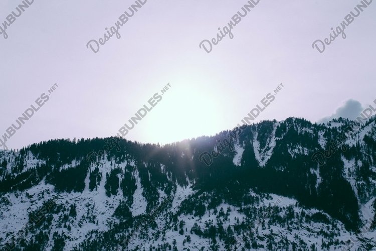 View of the rocky mountain with snow in Malam Jabba & Kalam example image 1