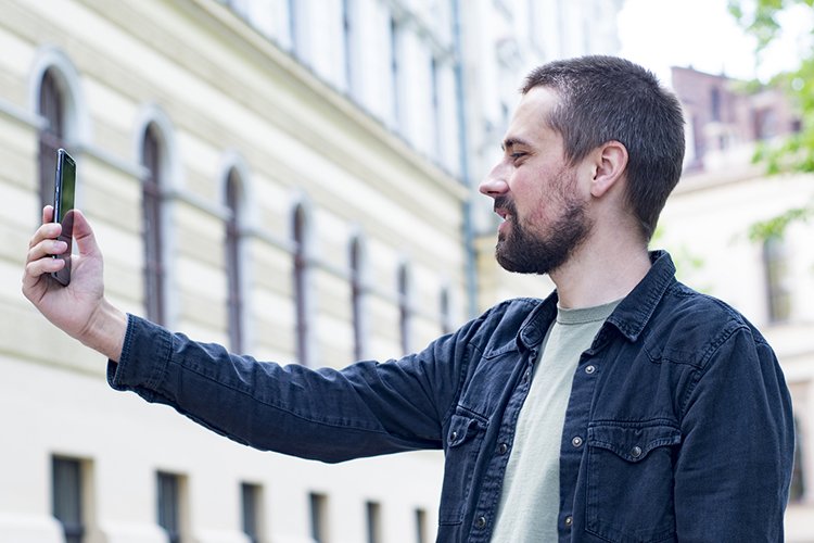 Bearded blogger with smartphone example image 1