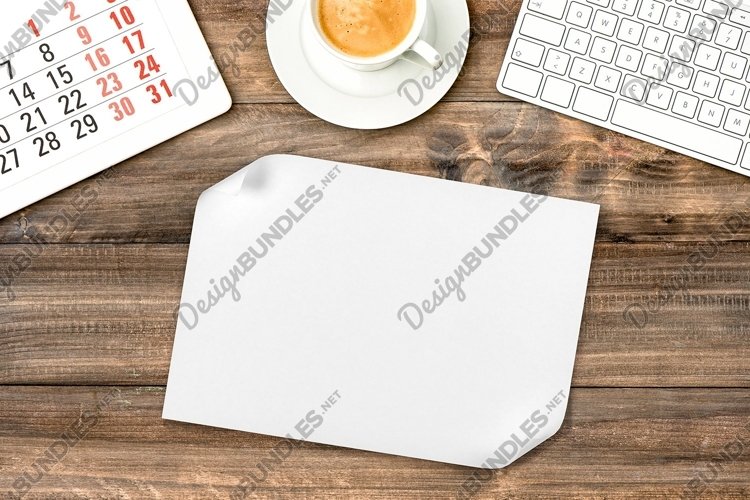 White paper sheet wooden background Office desk JPG