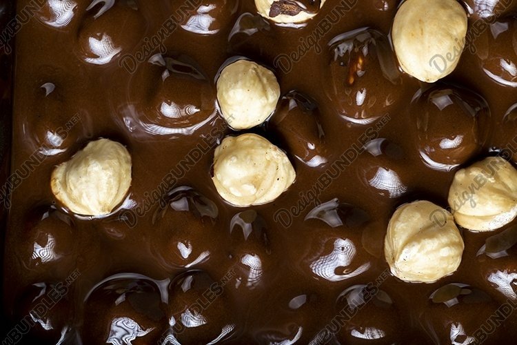 real milk chocolate while cooking with hazelnuts
