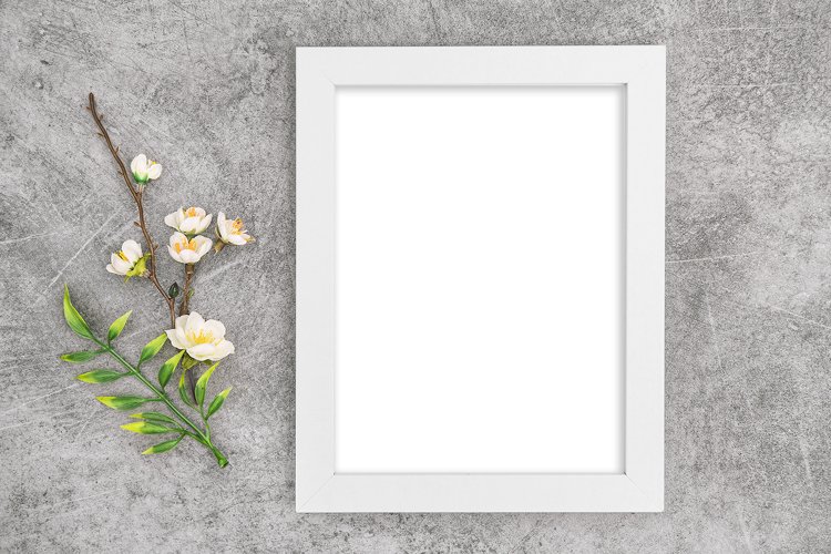 Frame mockup with floral Spring decoration stock photo example image 1