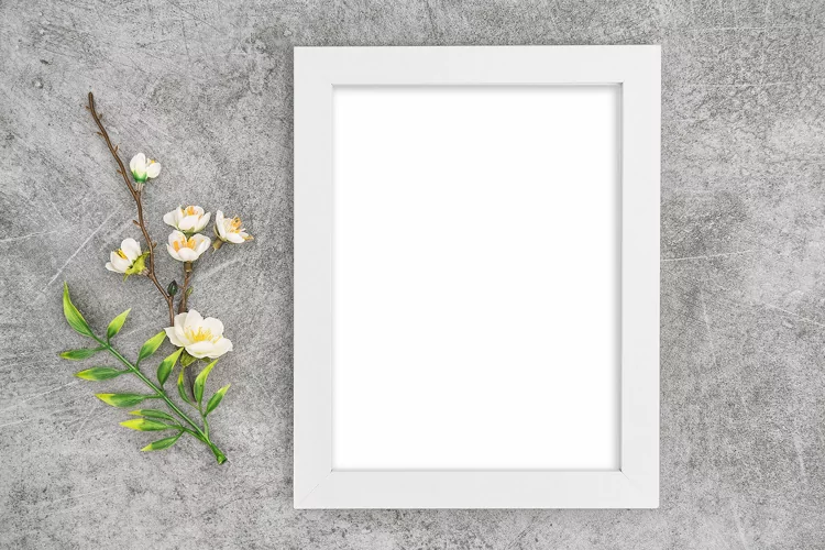 Frame mockup with floral Spring decoration stock photo