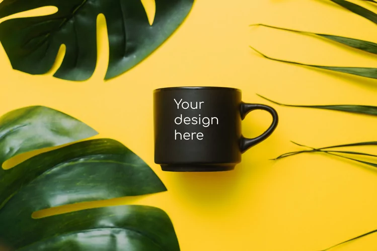 Mock up on a black matte mug on a tropical background