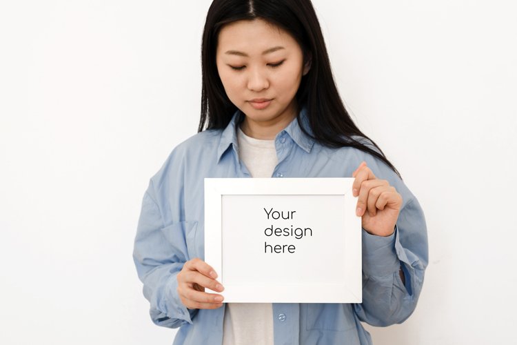 Close up white frame with mocap in asian woman hands example image 1