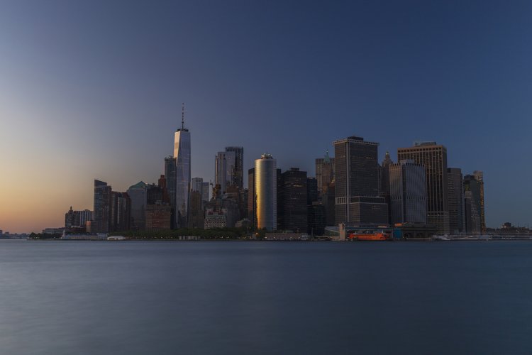 Financial district from Hudson river at sunset example image 1