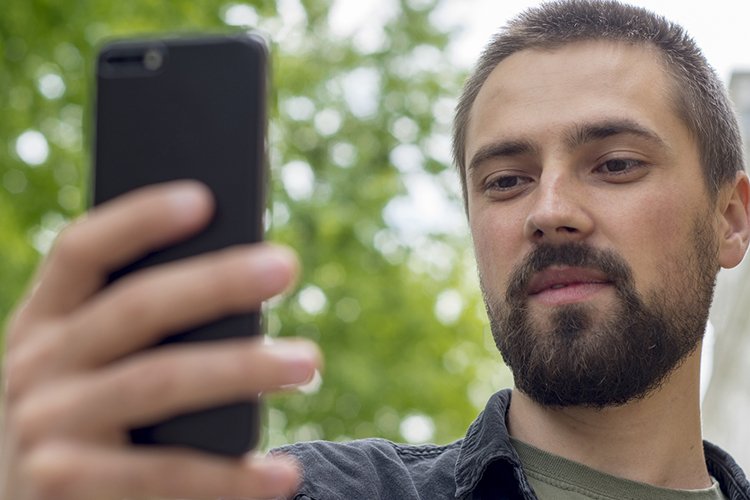 Caucasian man with phone
