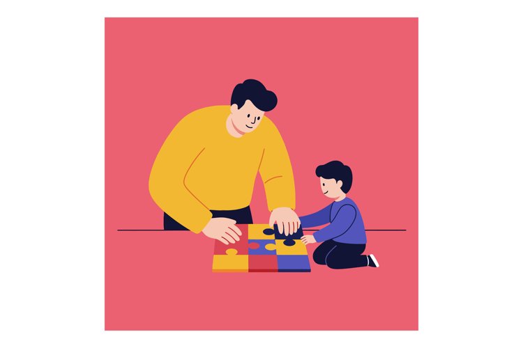Father and son playing together with colorful puzzle pieces