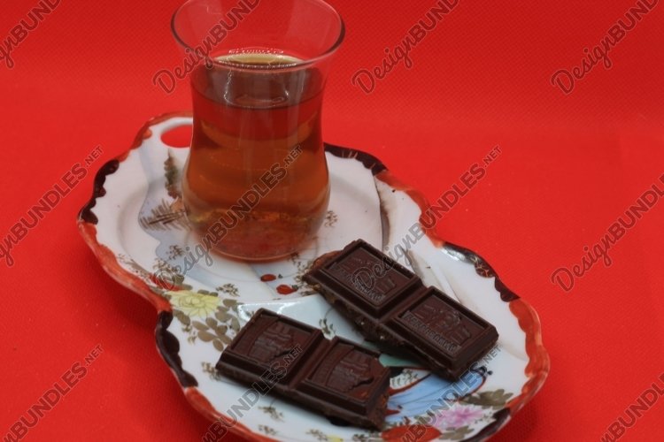 tea and chocolate on a saucer example image 1