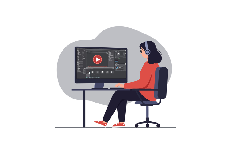 Young woman with headphones concentrating on video editing i