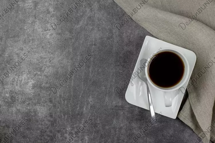 Black coffee cup flat lay on dark background copy space.
