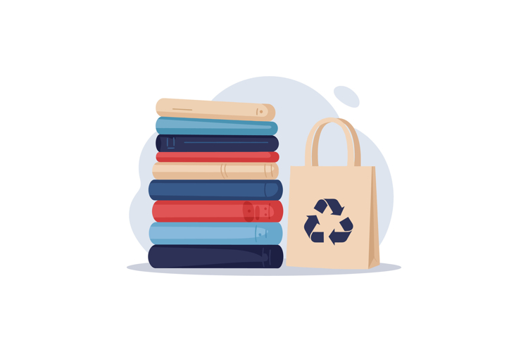 Stack of colorful books beside a reusable bag with recycling