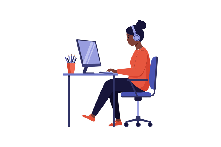A focused woman working at a desk with a computer in a flat