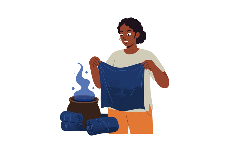 Woman dyeing fabric with indigo blue natural dye for textile
