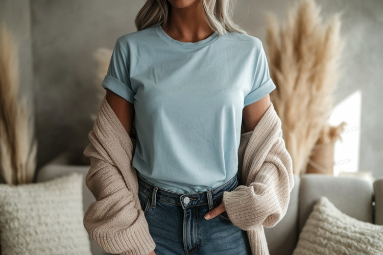 Light blue t shirt beige cardigan jeans image