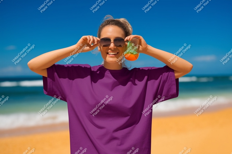 Woman wearing purple t shirt on beach image