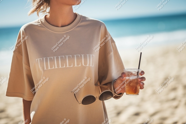 Woman holding drink sunglasses beach sand